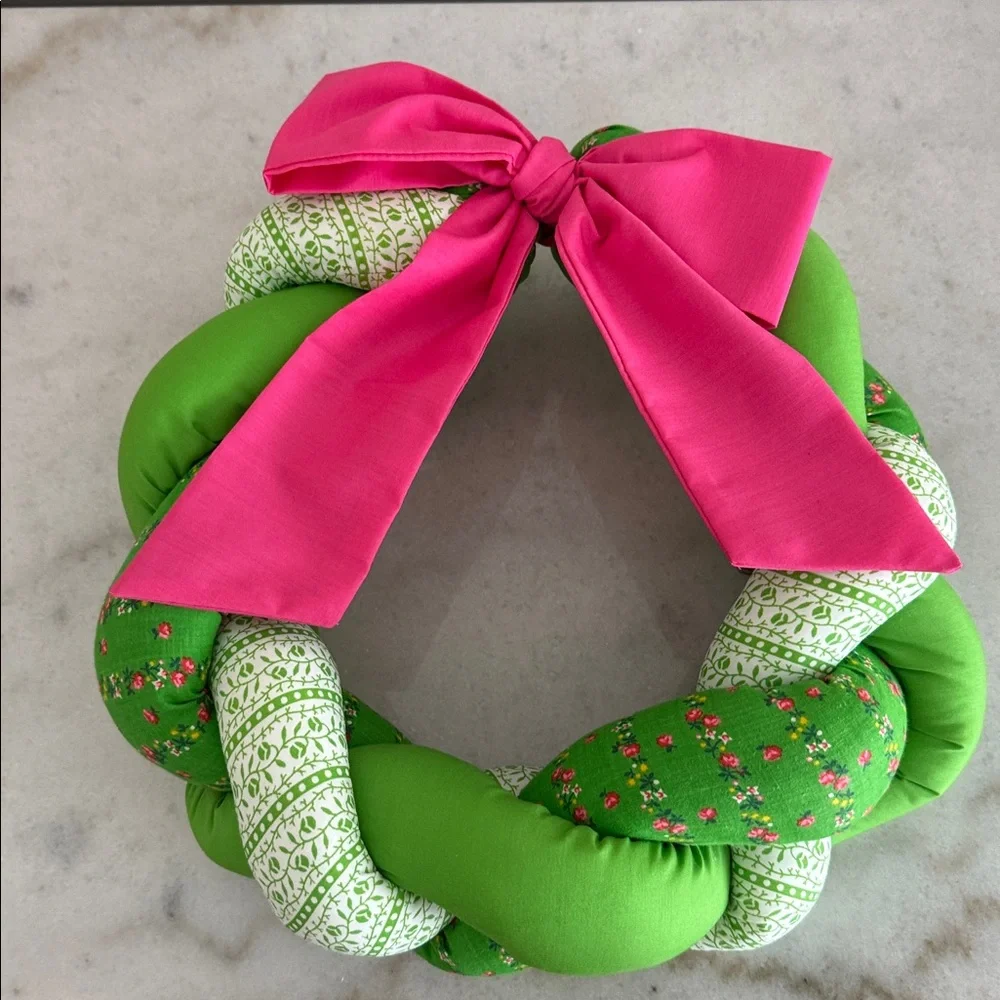 Vintage braided fabric plush wreath with pink ribbon